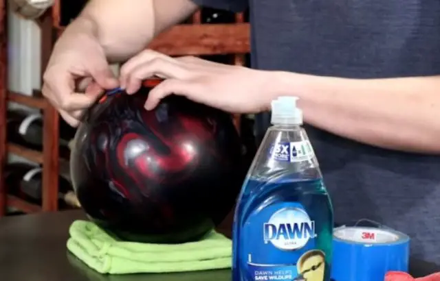 how to clean bowling ball finger holes